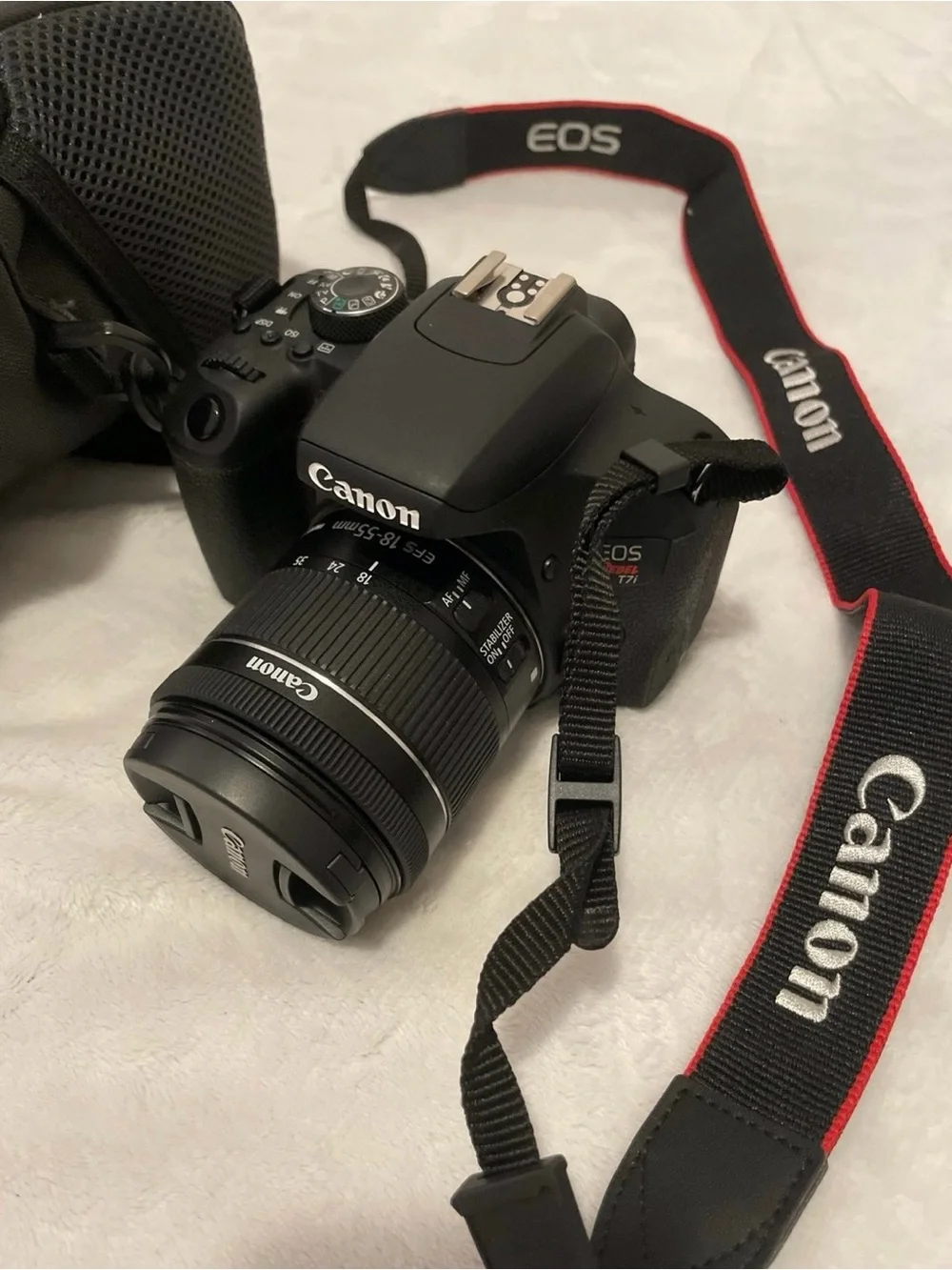 Canon EOS Rebel T7i DSLR Camera with 18-55mm Lens (with Bag)
